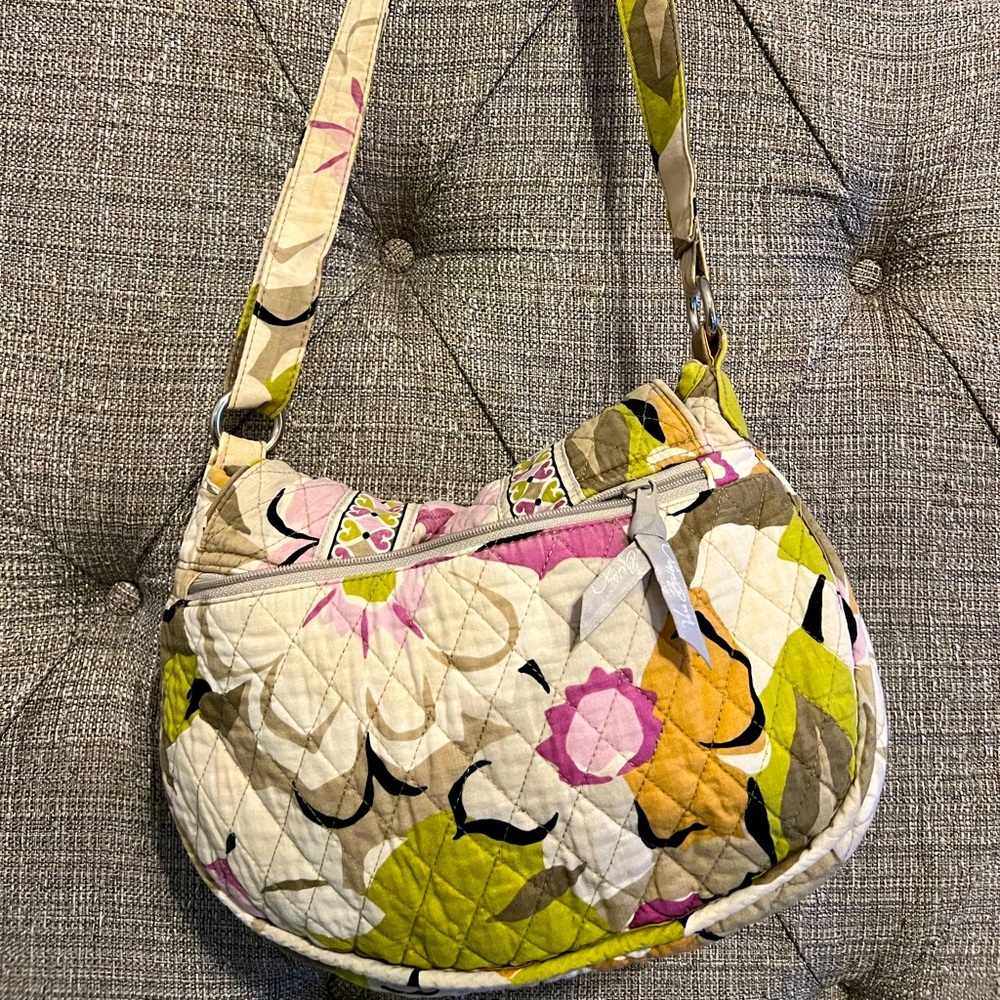 Vera Bradley boho bag has adjustable straps. Non smoking home.